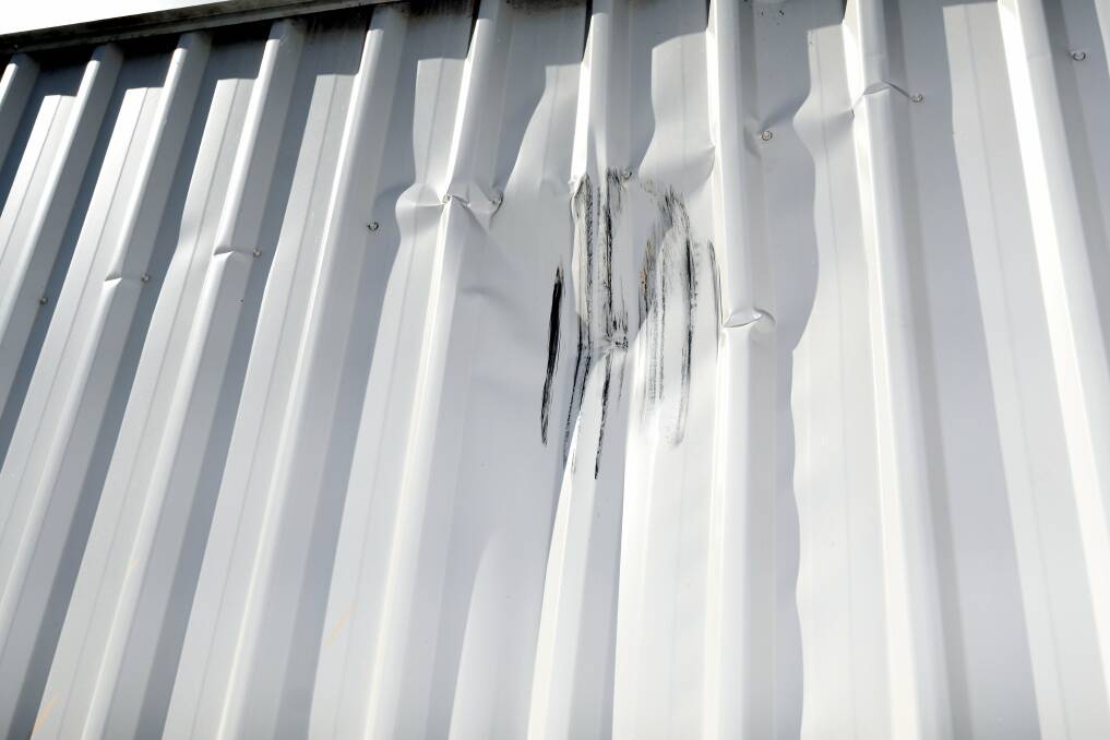 The damage to the shed after a tyre rolled down Mount Buninyong. Picture: Lachlan Bence