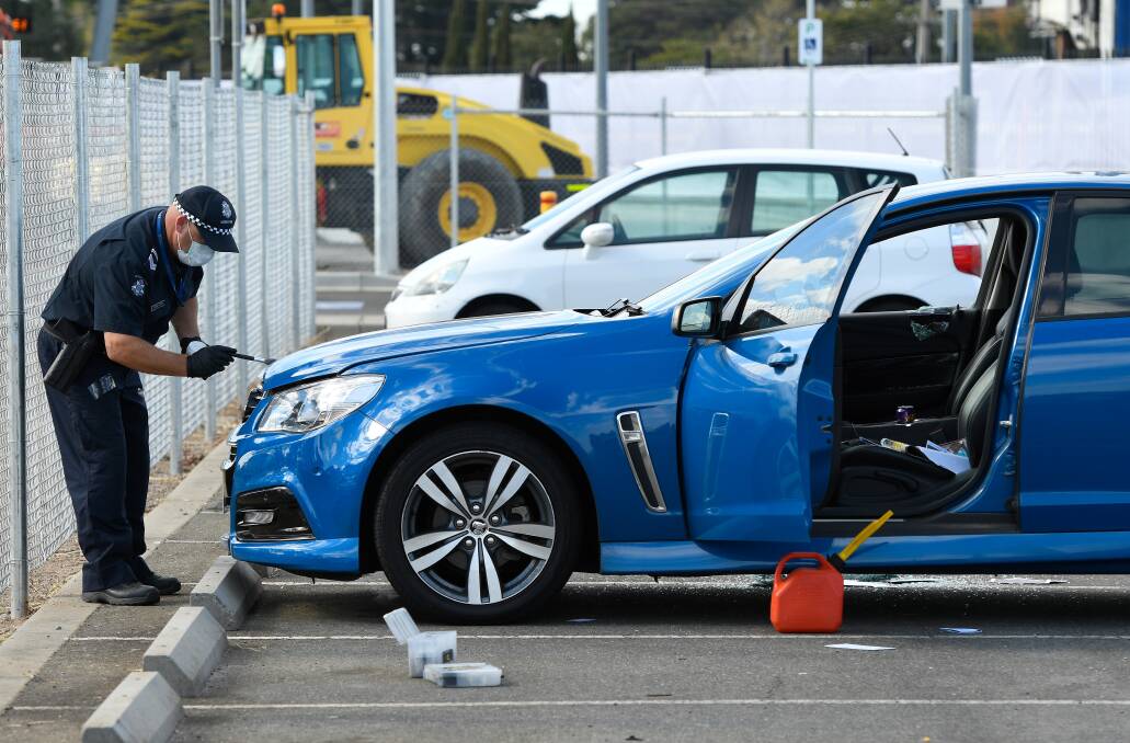 Forensic Police go through the scene at Wendouree Station. Picture: Adam Trafford