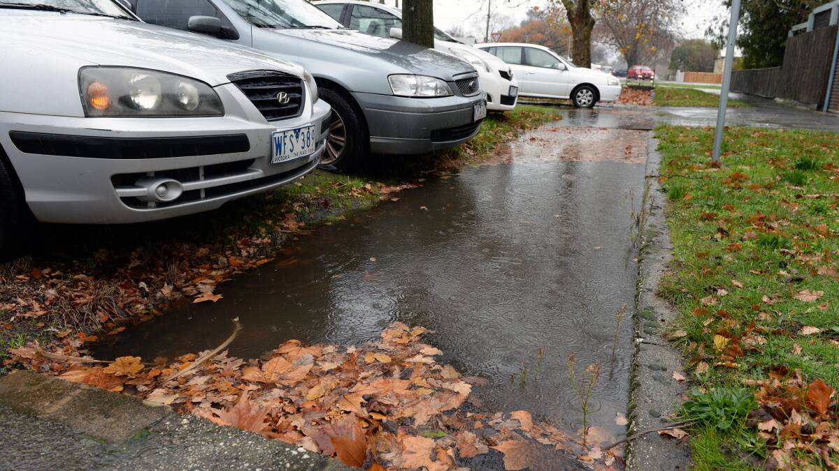 Blocked drains were one of the biggest issues in Ballarat on a soggy Wednesday. Picture: Kate Healy