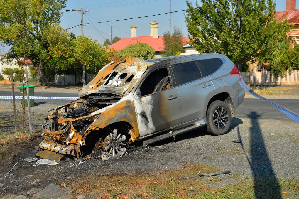 The burned out Pajero in Armstrong Street North this morning. Picture: Adam Trafford