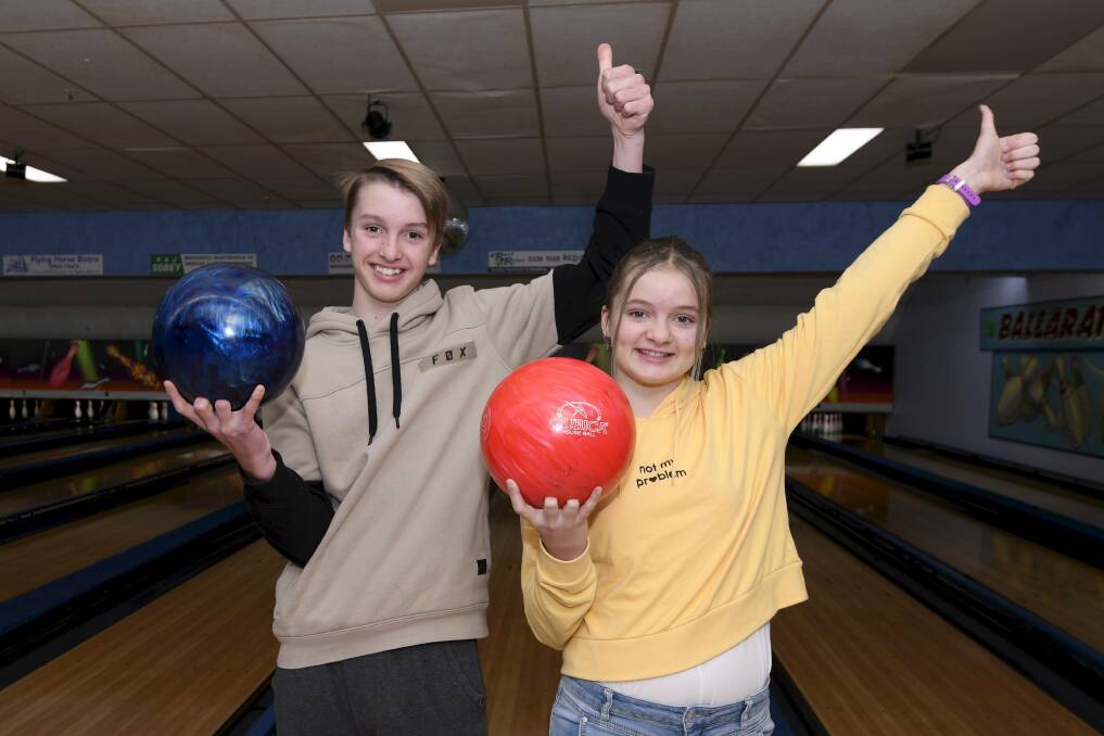 ROLLING: Josh, 13 and Fiona, 11, are among the many youngsters who have returned to the Ballarat Bowling Lanes during the school holidays. Picture: Lachlan Bence