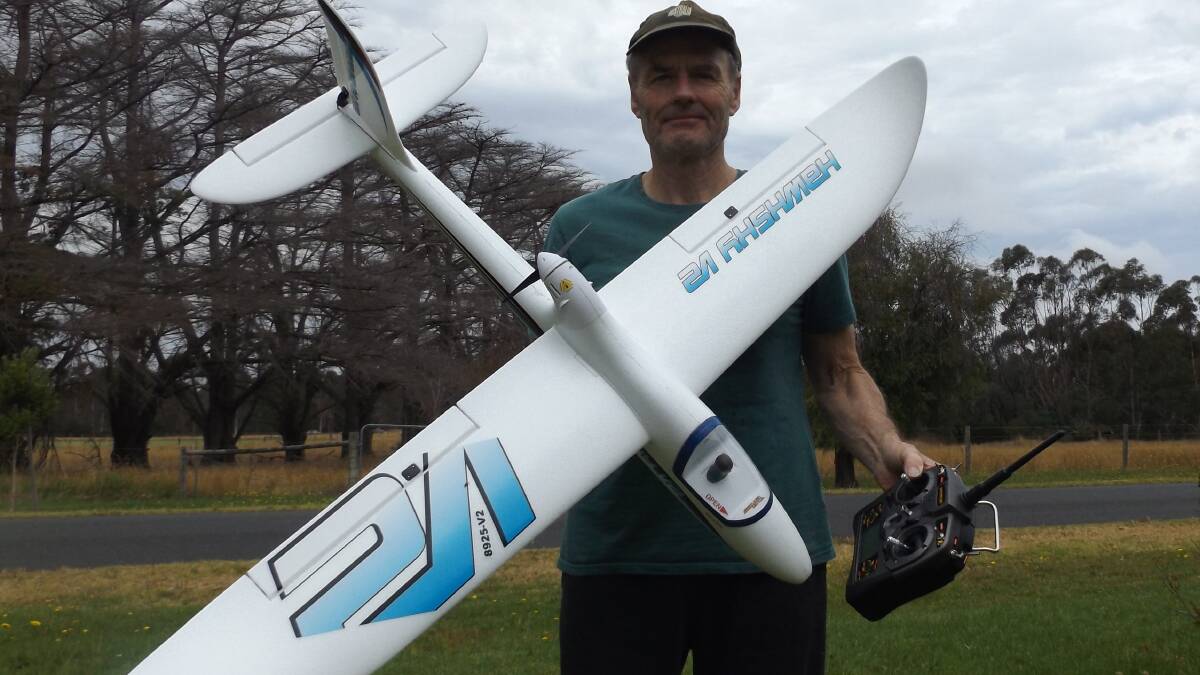 TAKE OFF: Ian Cole with a new look glider which will be on show as part of a come and try day Mountain Gliding day at Bald Hills on Sunday. 