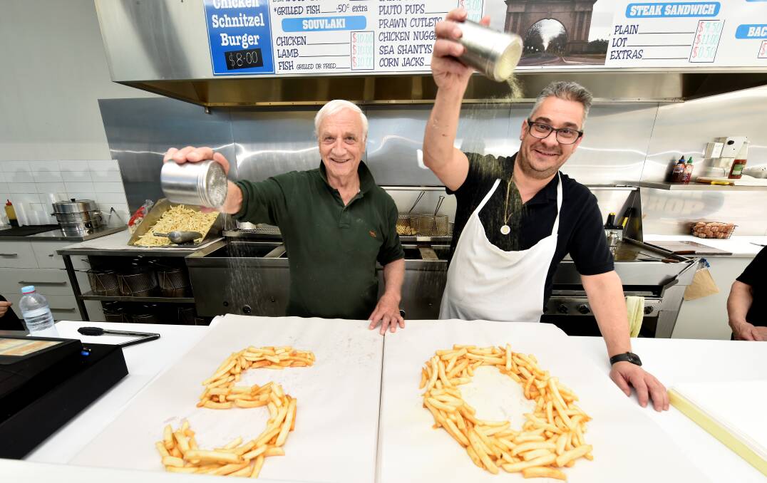 PLAIN OR CHICKEN SALT?: George and Andrew Grinos celebrating 50 years. Picture: Jeremy Bannister