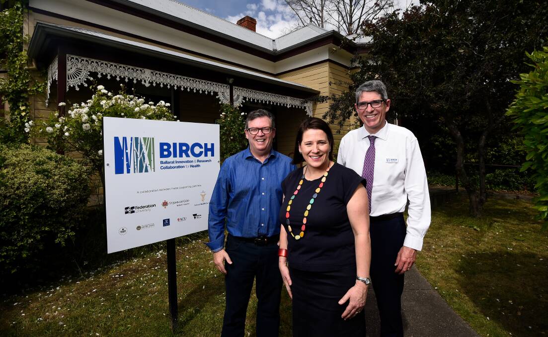 IMPRESSED: Parliamentary secretary for medical research Frank McGuire, Wendouree MP Juliana Addison and Associate Professor Mark Yates at BIRCH. Picture: Adam Trafford