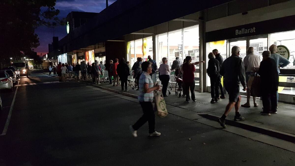 Crowds started lining up outside Eastwood Street supermarkets this morning before light. Picture: Rachael Marchant