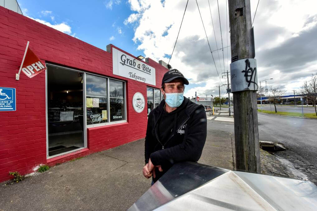 LOCKDOWN BLUES: Grab-A-Bite Takeaway co-owner Lachlan Berriman might have to shut doors this week. Picture: Jeremy Bannister