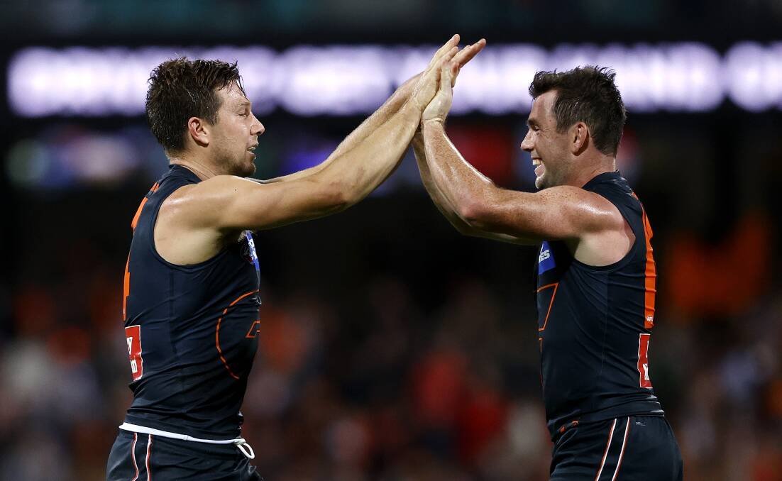 WINNING FORM: Toby Greene and Brent Daniels celebrate the win against the Swans earlier this season. Picture: Phil Hillyard/GWS Giants