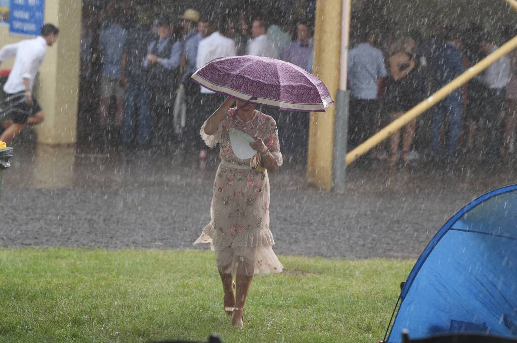 Racegoers were shocked by a sudden downpour at the Ballarat Cup last year. It is hoped that the racetrack will become weather proof in years to come. Picture: Kate Healy