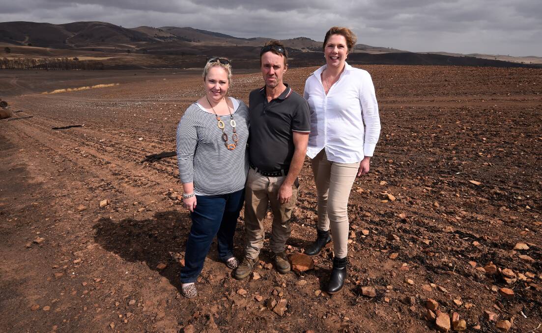 Farmer Rod McErvale, pictured with his wife Rebecca and Ballarat MP Catherine King, lost 1000 acres in the December fires. Picture: Adam Trafford