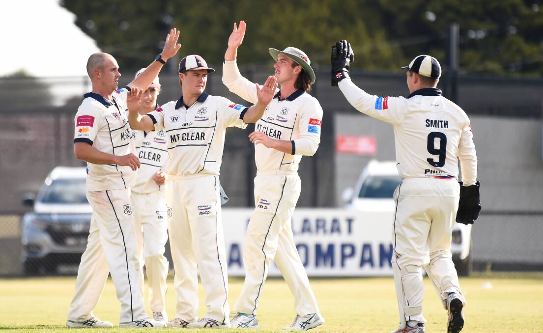 Mount Clear players celebrate a wicket against Wendouree on Saturday. Picture by Adam Trafford