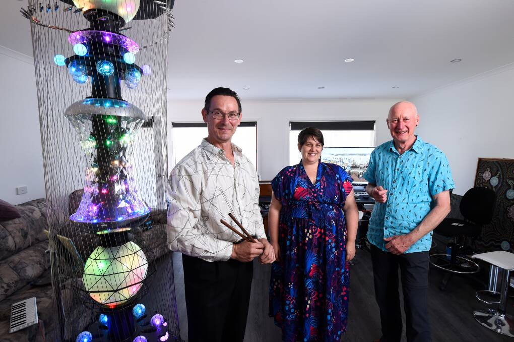 UNIQUE: Artist Zlatko Balazic, Poet Megan J Riedl and Festival Co-ordinator Barry Wemyss with a Cylindrical Light Harp, made by Zlatko. Picture: Adam Trafford
