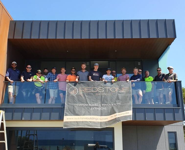 Tradies paid a tribute to Greg Roberts by finished two town houses in Portarlington on Saturday. Picture: supplied