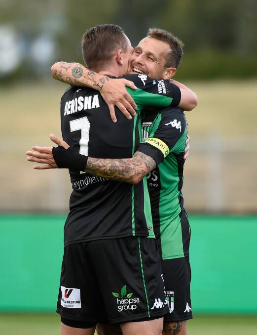 FOUR TO THE FLOOR: Western United Besart Berisha celebrates another goal with Alessandro Diamanti. Picture: Adam Trafford