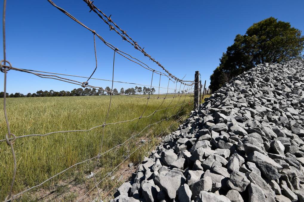Gravel left against an electric fence. Picture: Adam Trafford