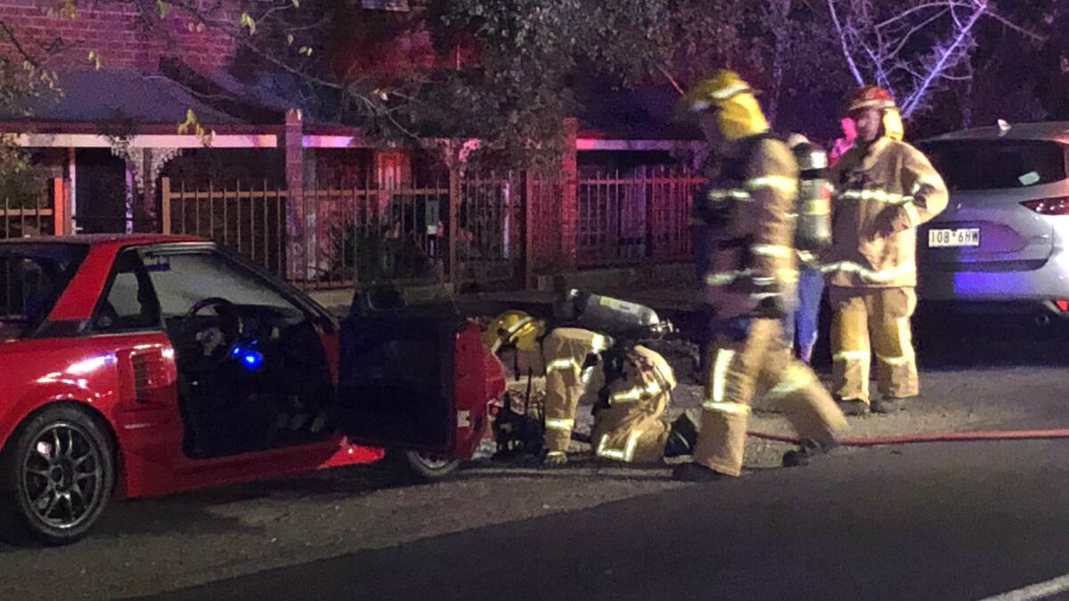 Fire crews on the scene of another car fire in Soldiers Hill tonight. Picture: Greg Gliddon