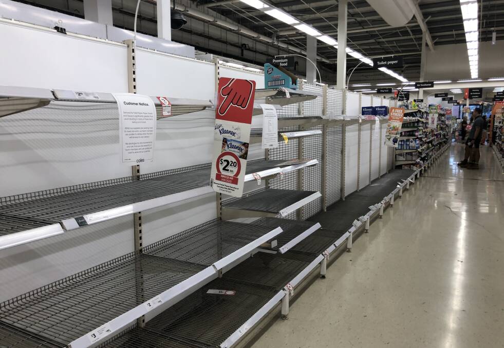 However, when shoppers found their way into the store, they were greeted by a familiar site of an empty toilet roll shelf. Picture: Greg Gliddon