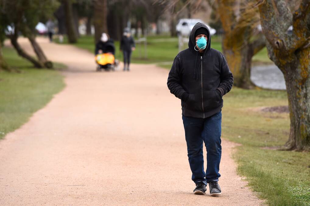 Outdoor mask wearing could be the first restriction to go. 