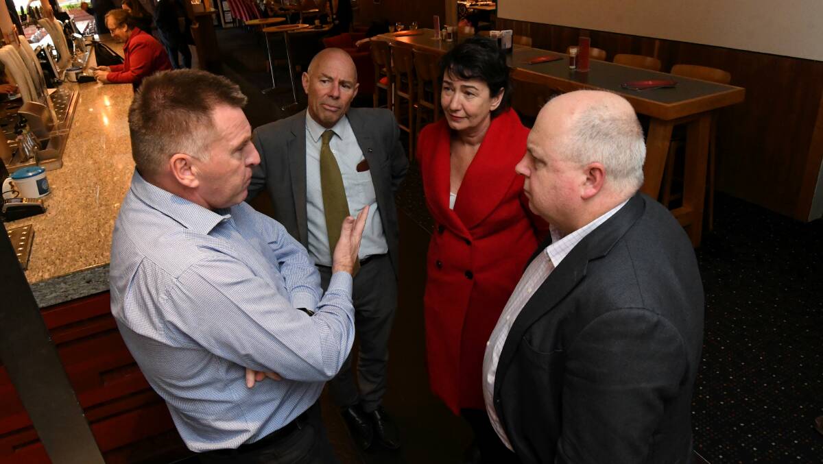 Treasurer Tim Pallas (right) was recently in Ballarat to speak with businesses who will benefit from payroll tax cuts in regional Victoria. Picture: Lachlan Bence