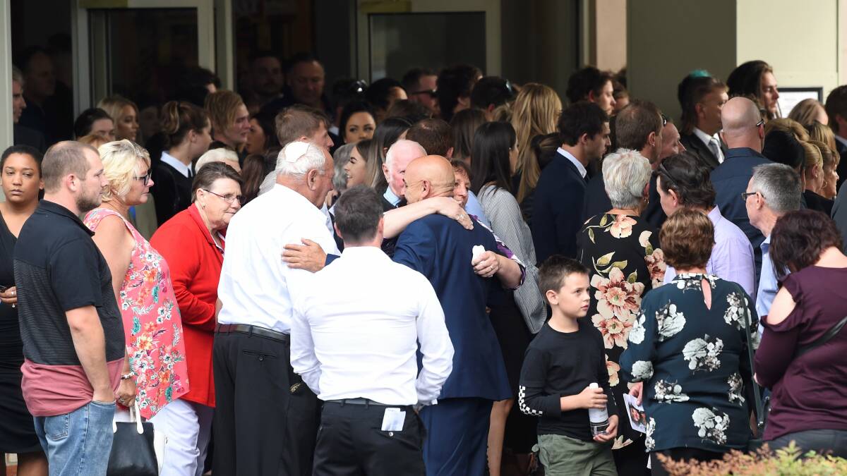 Mourners gather to farewell trench victim Jack Brownlee. Picture: Lachlan Bence