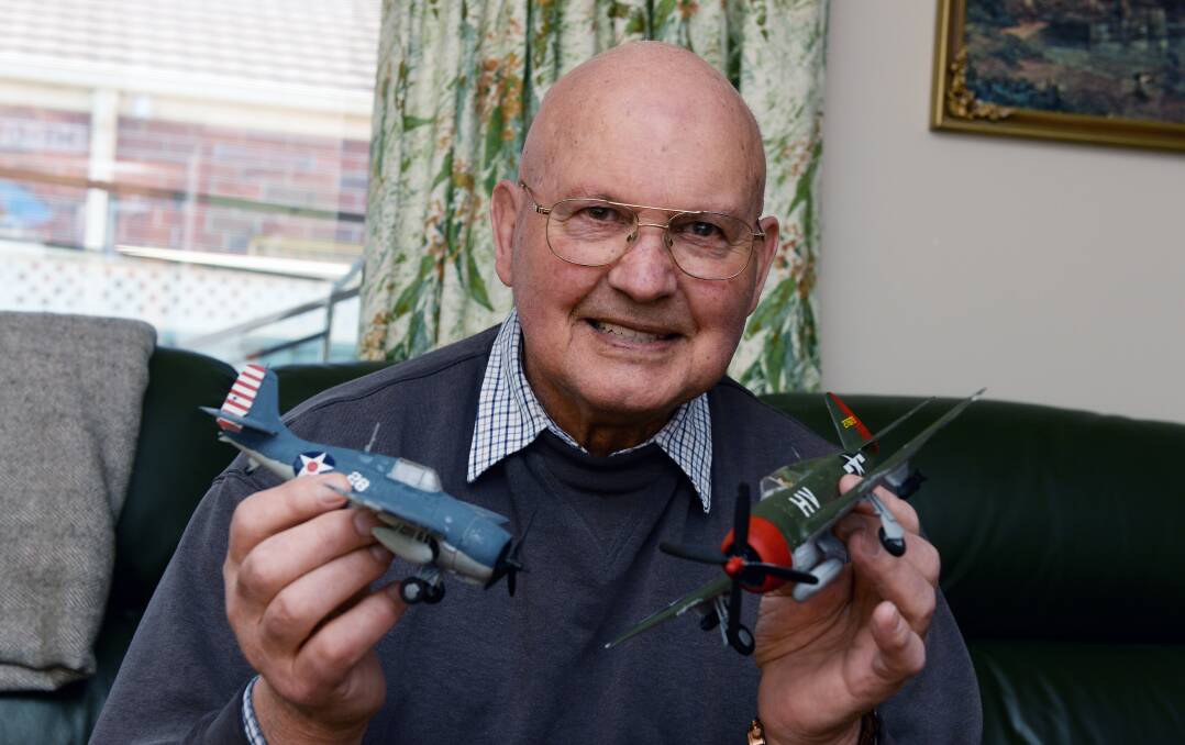 FLIGHT OF FANCY: Maurice Turner, 87, has been making model World War II planes for 18 years. Since COVID-19 restrictions have come in, he has made at least 20. Picture: Kate Healy