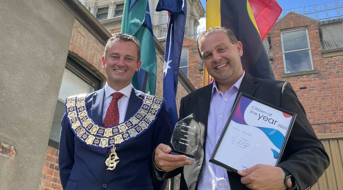 TOP OF TOWN: Daniel Cook (right), pictured with mayor Daniel Moloney after being awarded Citizen of the Year at a ceremony on Tuesday. Picture: Greg Gliddon
