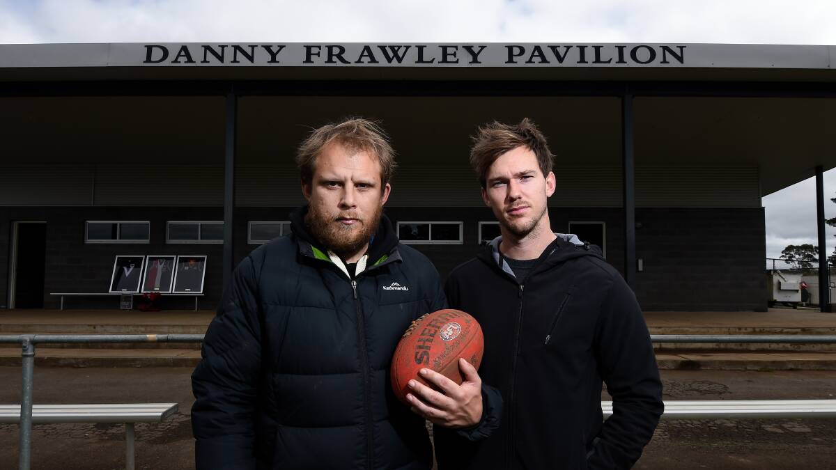 TRIBUTE: Luke Ward and Mason Rhodes celebrated the life of Danny Frawley by having a kick at Bungaree Oval on Tuesday. Picture: Adam Trafford