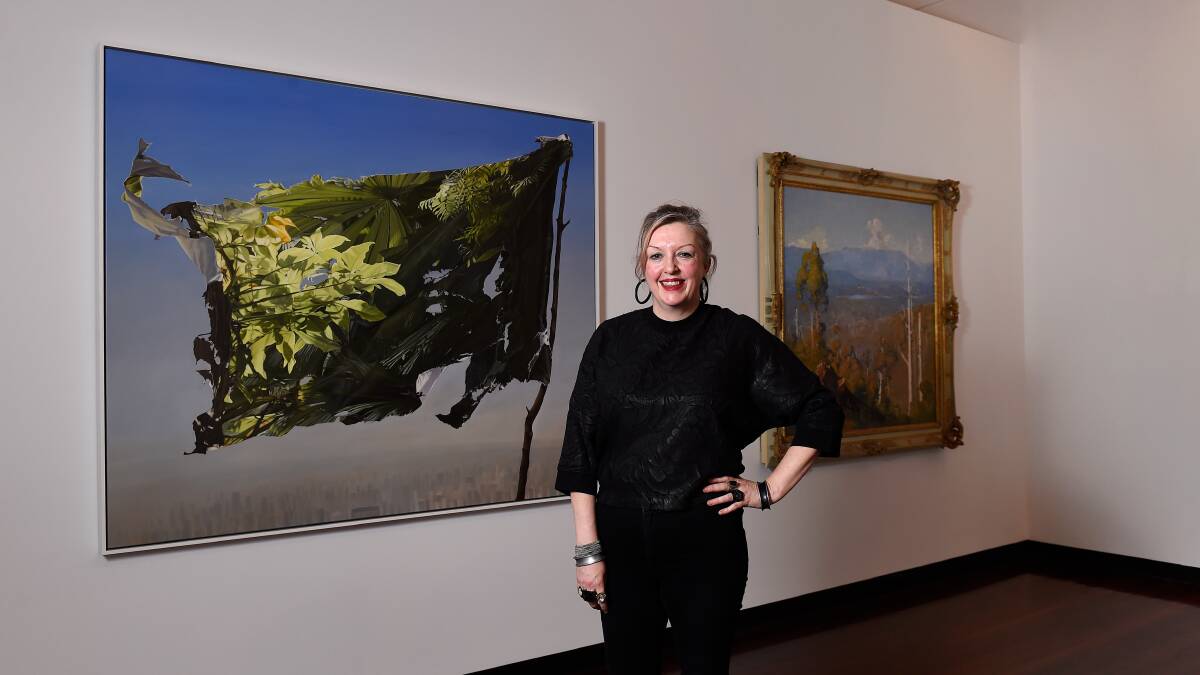 ON SHOW: Art Gallery of Ballarat Director Louise Tegart with some of the works which will be on display until April. Picture: Adam Trafford.