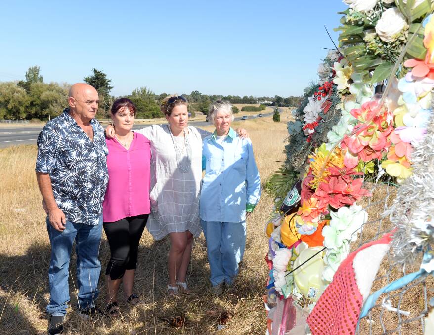 LASTING: Families visit the temporary memorial near the Winter Valley estate in March 2019, on the 12 month anniversary of the trench collapse. Picture: Kate Healy