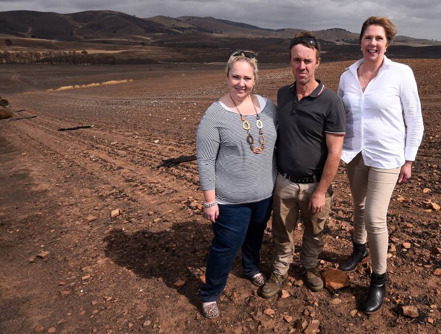 REMAINS: Rebecca and Rod McErvale show Ballarat MP Catherine King around their scorched property a month after a blaze tore through their land. Picture: Adam Trafford.