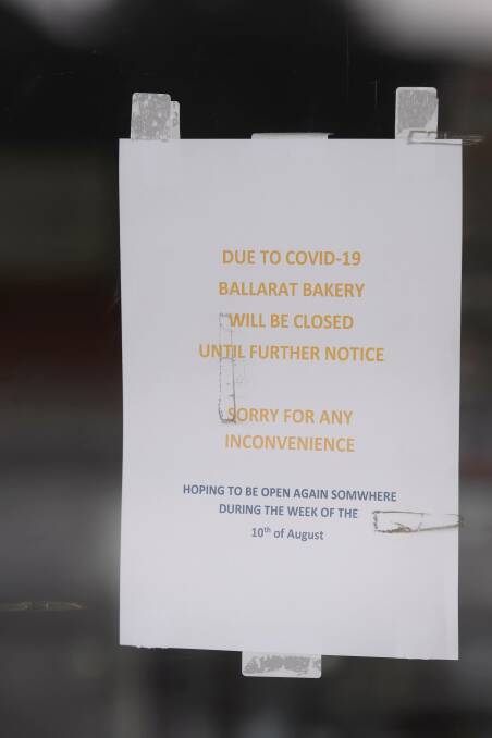 The sign on the front door of a bakery in Latrobe Street Delacombe.