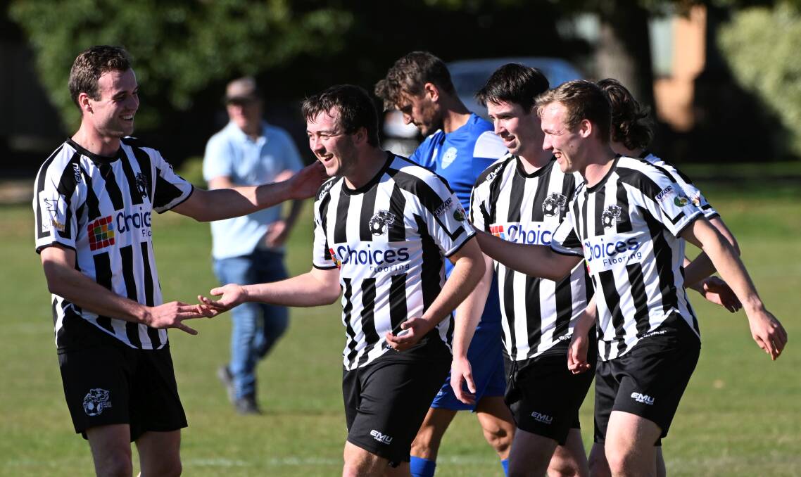 Ballarat North United players celebrate after scoring against Maryborough on Sunday. Picture by Lachlan Bence
