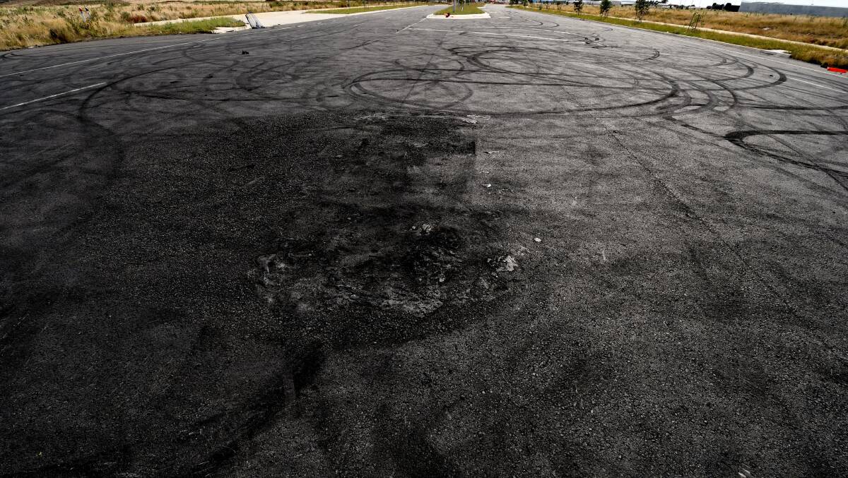The roads are black and in some parts have been ripped up by hoon drivers doing doughnuts. Picture: Lachlan Bence