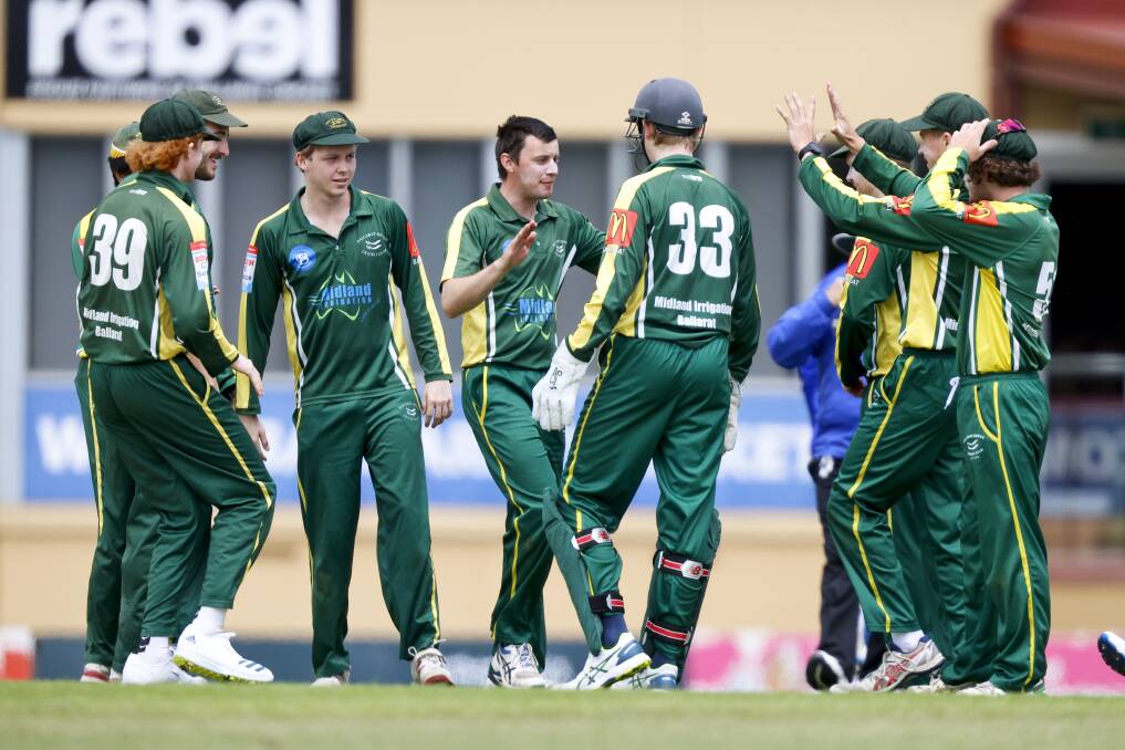 GOT 'IM: Ballarat-Redan players celebrate one of their three wickets against Golden Point. Picture: Luke Hemer