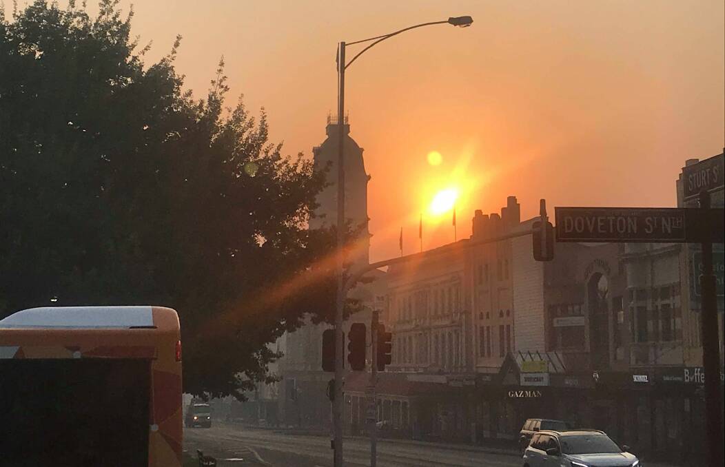 The eerie sunrise over central Ballarat this morning. Picture: Ben Hopkins 