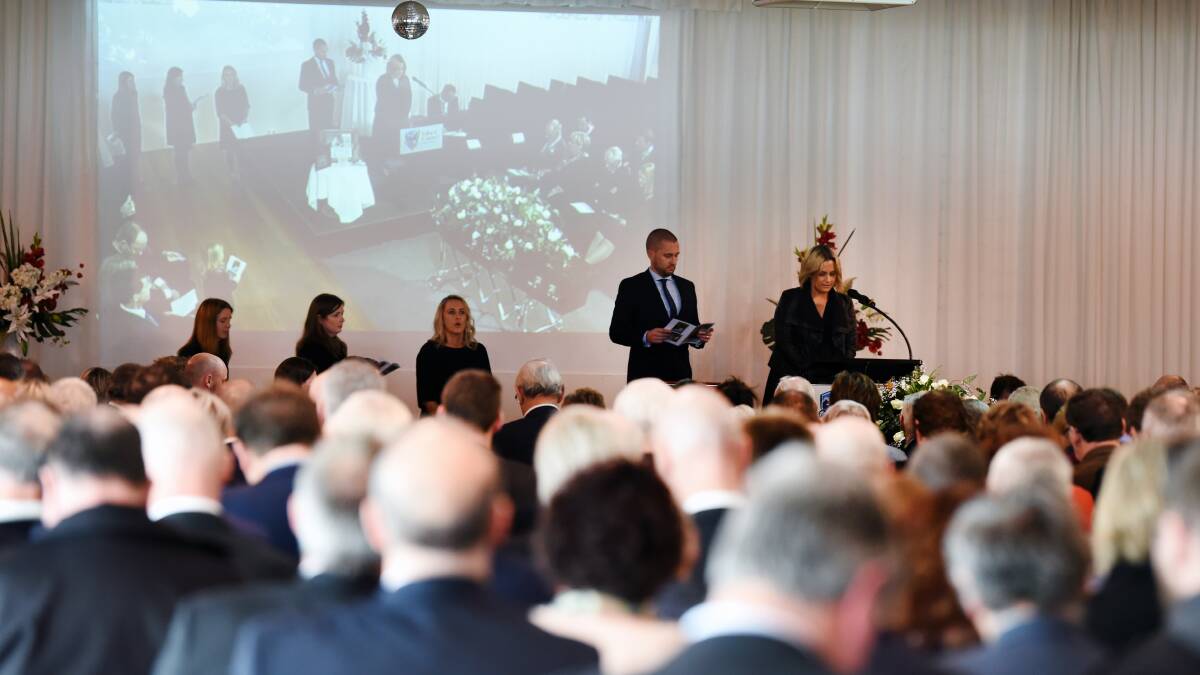 Hundreds of mourners say a final farewell to Ian Larkin. Picture: Kate Healy
