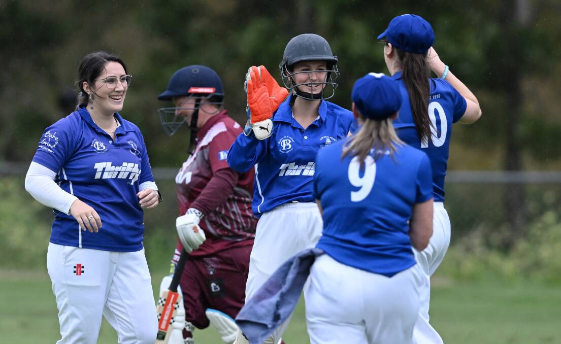 Gemma Maggi, Imogen O'Brien, Laura Hooper and Maddy Ogilvie celebrate another wicket for Golden Point Blue. Picture by Kate Healy
