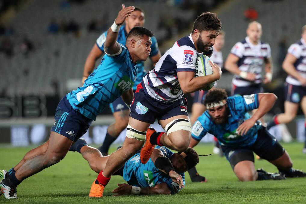 BALLARAT BOUND: Colby Faing'a of the Rebels is tackled during the Round 16 Super Rugby match against the Blues last year.