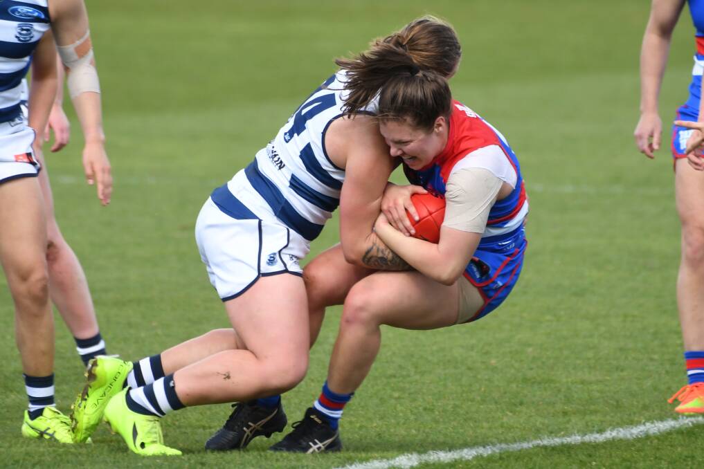 Geelong has held off a fast-finishing Western Bulldogs to win its ...