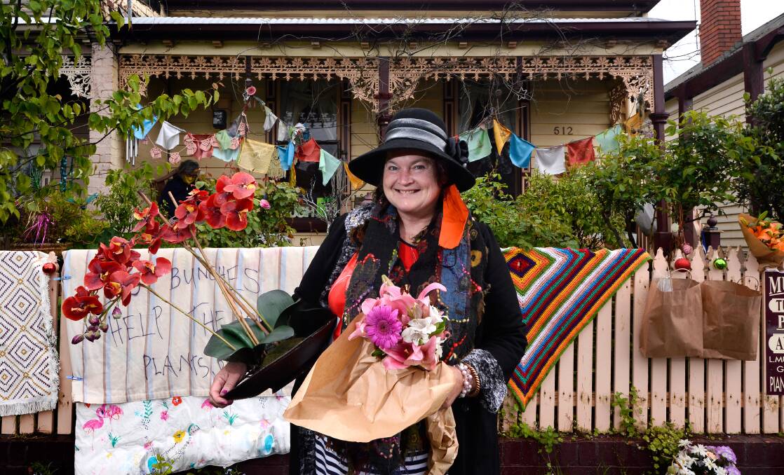 IN BLOOM: Alison Robertson has started a pop-up florist to help homeless people. Picture: Adam Trafford