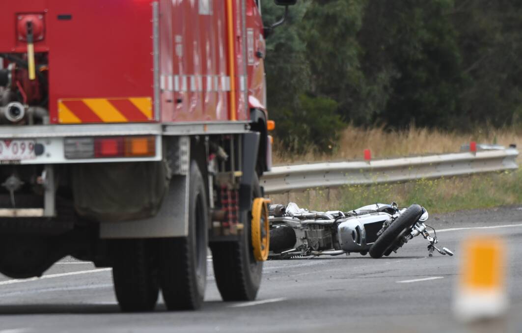 TRAGIC SCENE: A motorcyclist was killed after his bike lost control on the Western Freeway near Ballan on Friday afternoon. Picture: Lachlan Bence