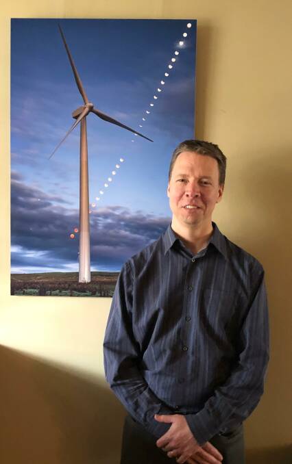 ASTRONOMICAL: Phil Hart with one of his Biennale open prize winning photos, taken at the Waubra Windfarm. Picture: Greg Gliddon 