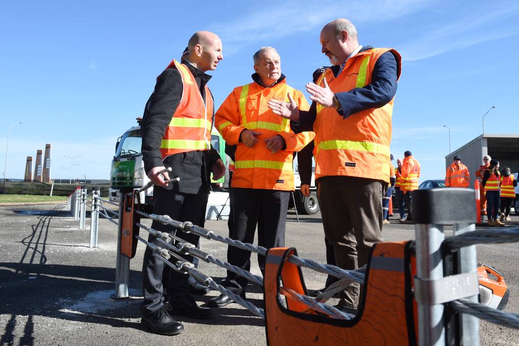 Julian Govan (Director of SprayLine Road Services), Mal Kersting (Regional Director Vicroads) and Bryan Sherritt (VicRoads' safe system infrastructure program director) at the training centre in Ballarat. Picture: Kate Healy 