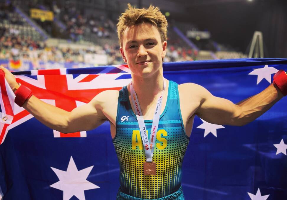 Nicholas Howard celebrates his bronze medal on the vault. Picture supplied