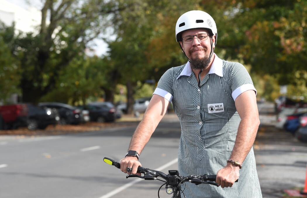 PEDAL POWER: Ryan Moore is preparing to cycle from Melbourne to Adelaide in a school dress to raise awareness for female education. Picture: Kate Healy