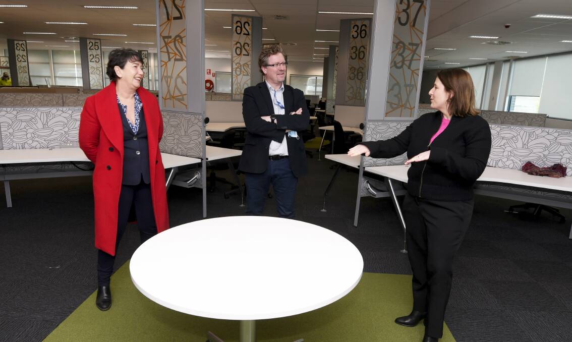 Buninyong MP Michaela Settle (left) and Wendouree MP Juliana Addison (right) toured the new look call centre on Thursday with Federaion University's Esecutive Director Technology Parks Jeff Pulford. Picture: Lachlan Bence