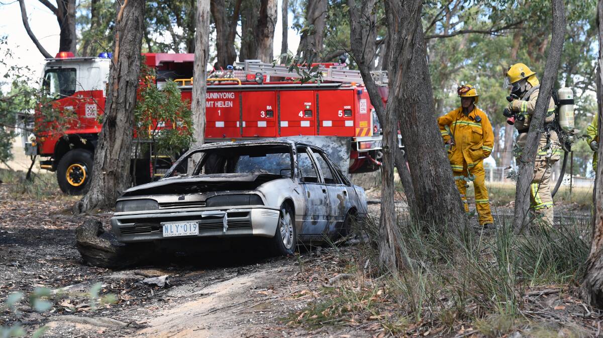 This car was found burned out in the middle of the day near houses in Buninyong. Picture: Kate Healy