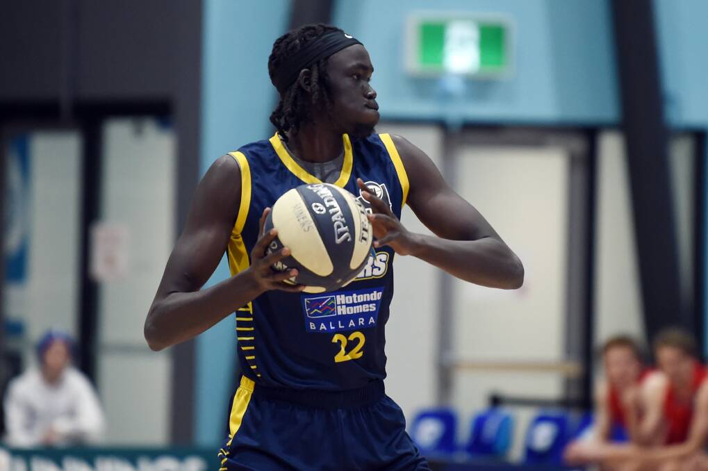 Deng Acouth did his best to lift his side on Saturday night until he found himself in foul trouble. Picture: Kate Healy