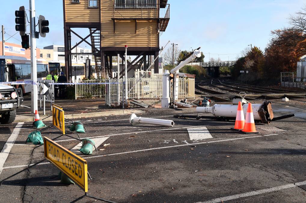 The Lydiard Street rail gates were destroyed by an out of control train on Saturday night. Picture: Adam Trafford