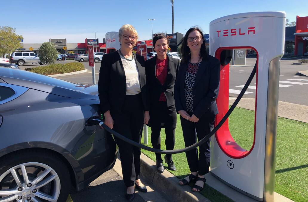 Senator Janet Rice, City of Ballarat councillor Belinda Coates and Greens candidate for Ballarat Karen McAloon at the Tesla charge facility in Wendouree. Picture: Greg Gliddon