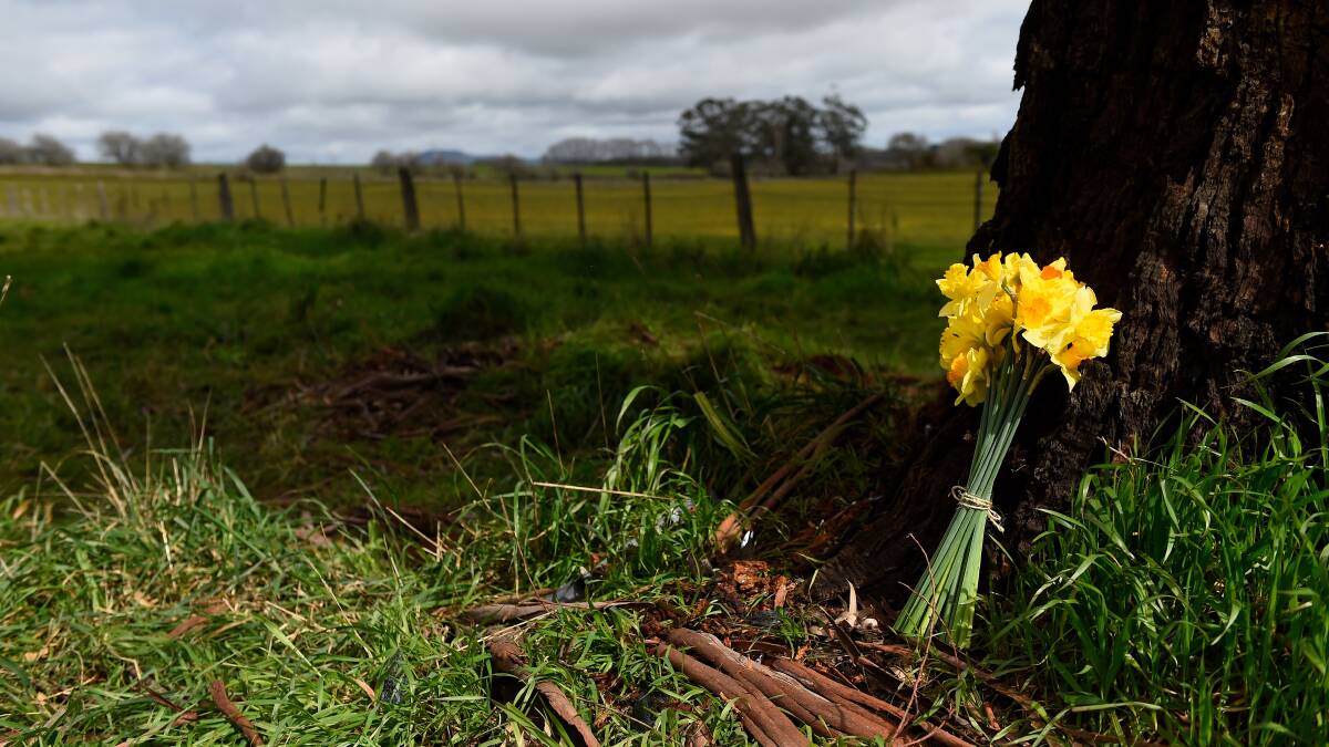 Flowers at the tree where AFL legend Danny Frawley died on Monday. Picture: Adam Trafford